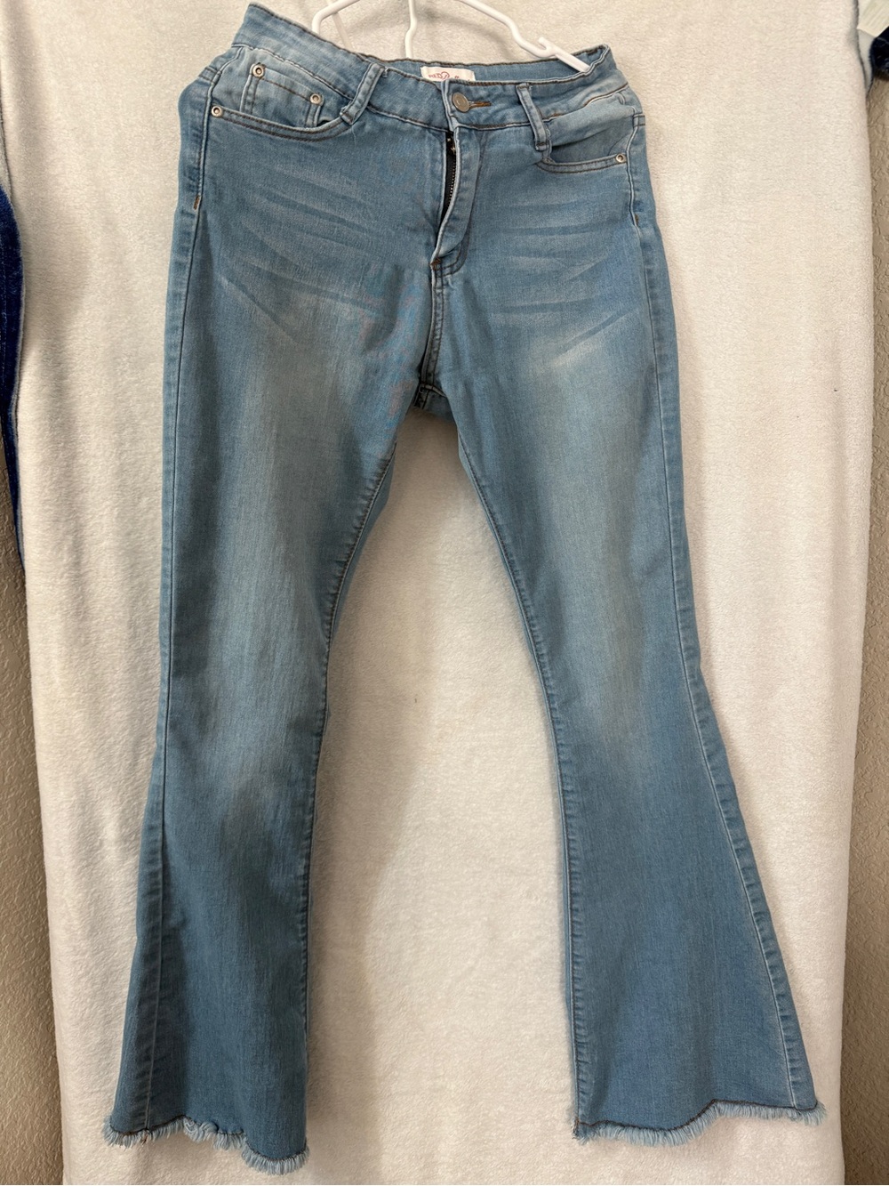 Red bottom brand flare jeans